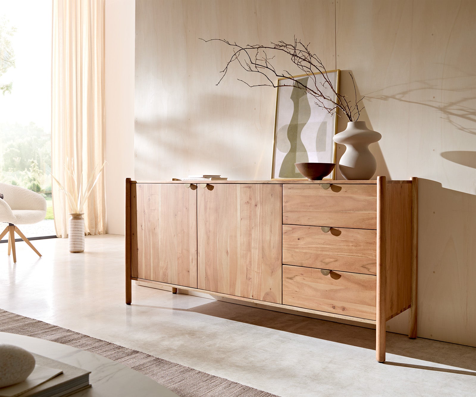 Sideboard Caius 175cm made from natural Acacia wood with sleek design and ample storage, perfect for modern interiors